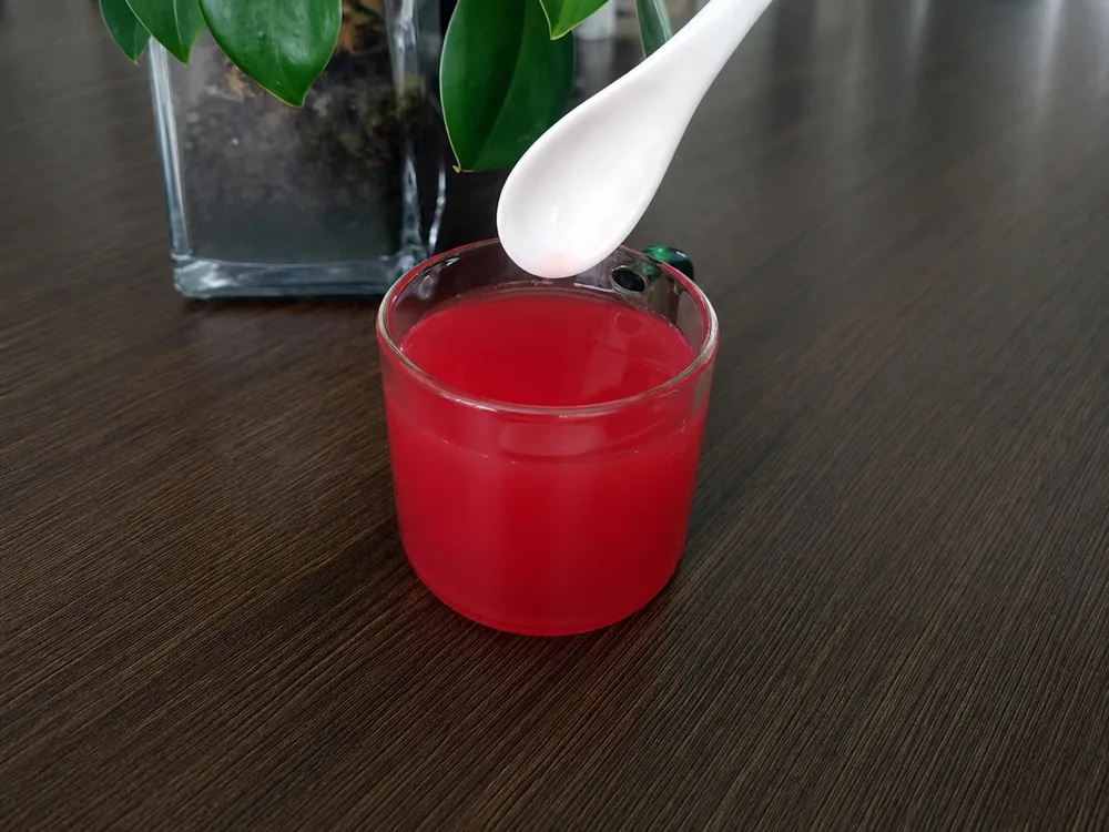 Red Lycopene liquid in a glass